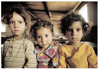 These girls are among more than four million Palestinian refugees in Gaza Strip and the West Bank. A recent report from the Refugee Nutrition Information System found Palestinian refugees to be satisfactorily coping with the nutritional impacts of the latest Intifada. [Corbis. Reproduced by permission.]
